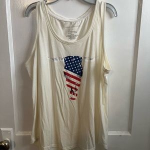 Cream colored sleeveless shirt
